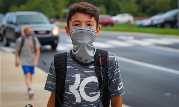 student smiles on first day of school